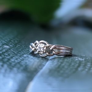 14k White Gold, .05ct Diamond Puzzle Ring